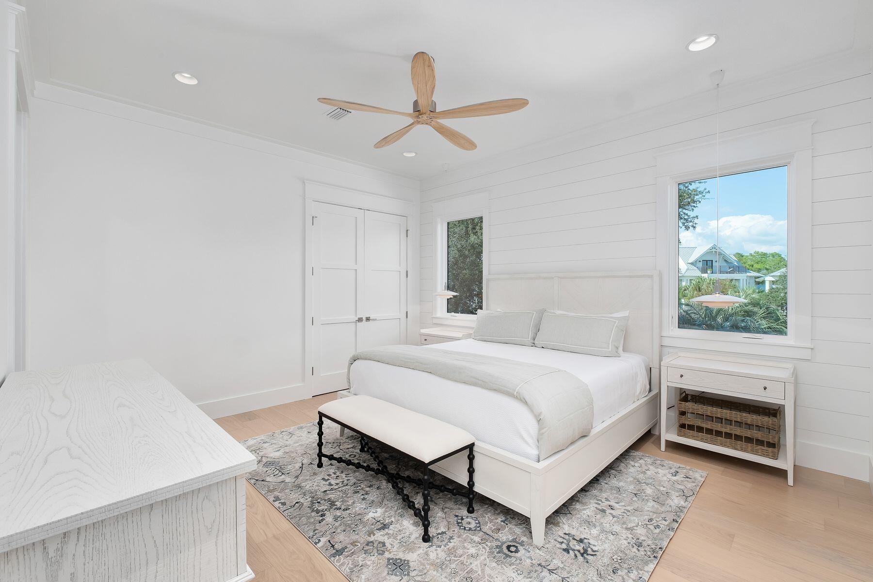 56 Pelican Glide Lane Seacrest, FL 32461 - Photo 34 of 55 a bedroom with a bed and a window