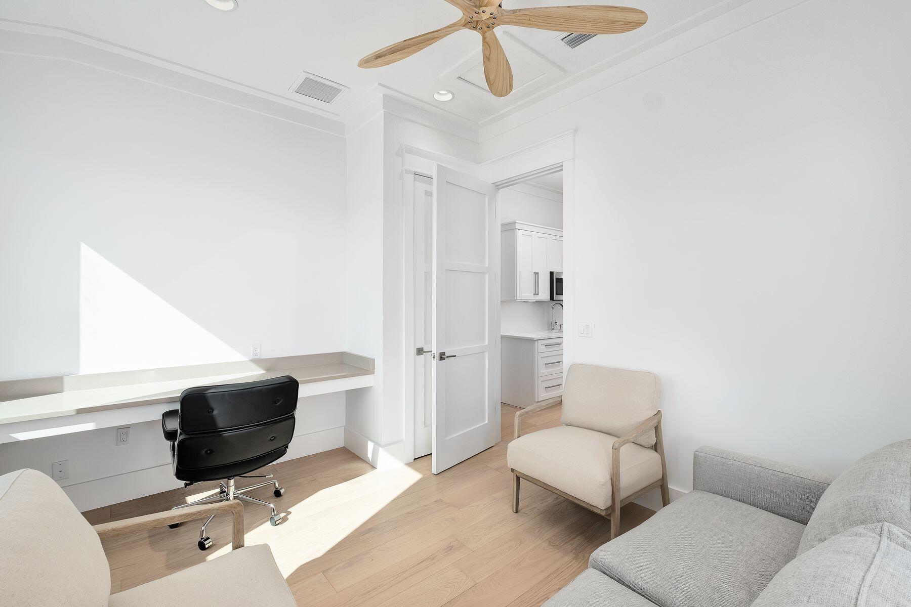 56 Pelican Glide Lane Seacrest, FL 32461 - Photo 47 of 55 a living room with furniture and a rug