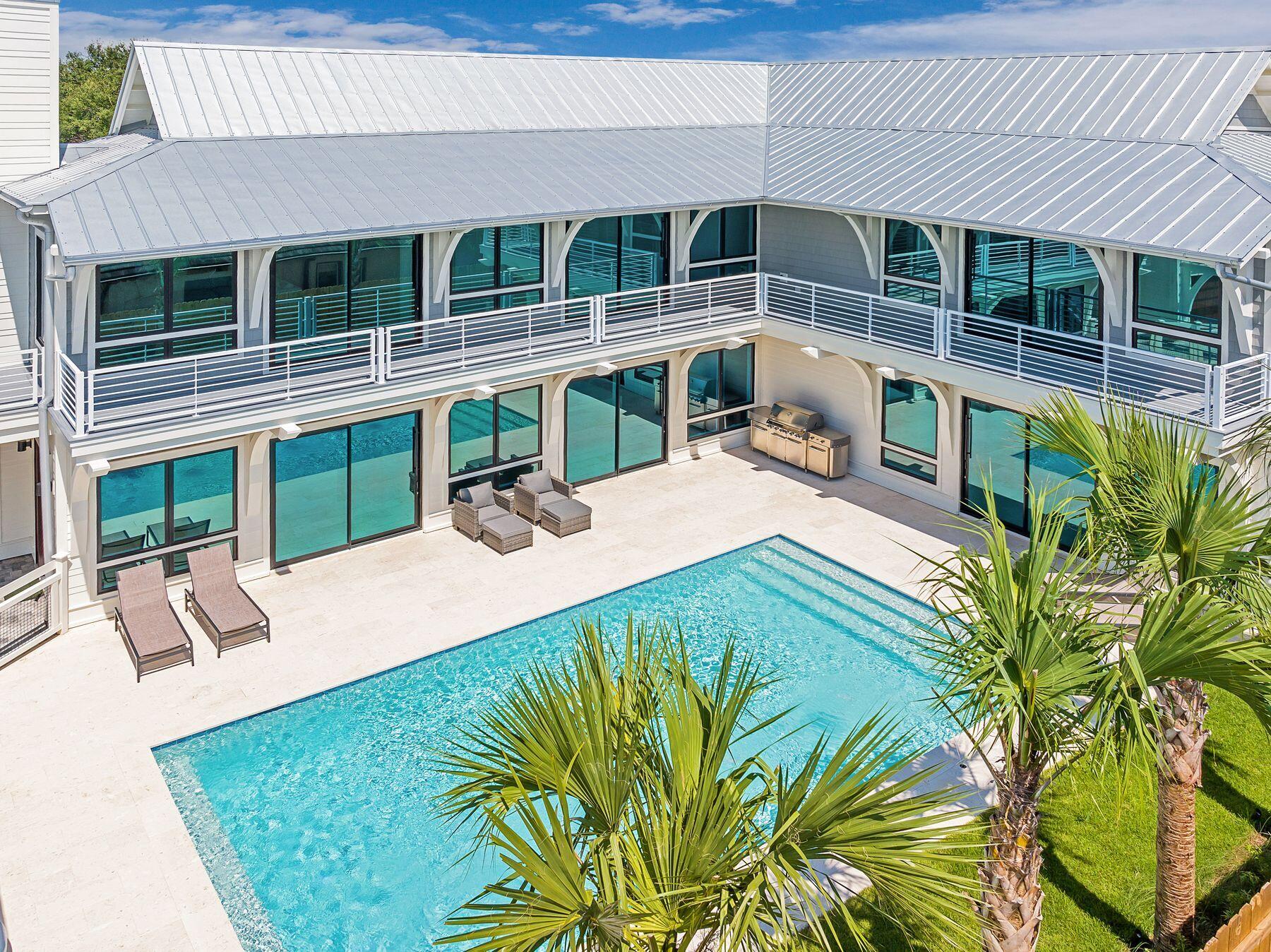 56 Pelican Glide Lane Seacrest, FL 32461 - Photo 48 of 55 front view of a house with a yard