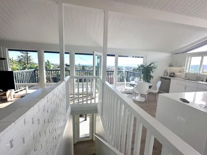 a view of living room with furniture and garden view