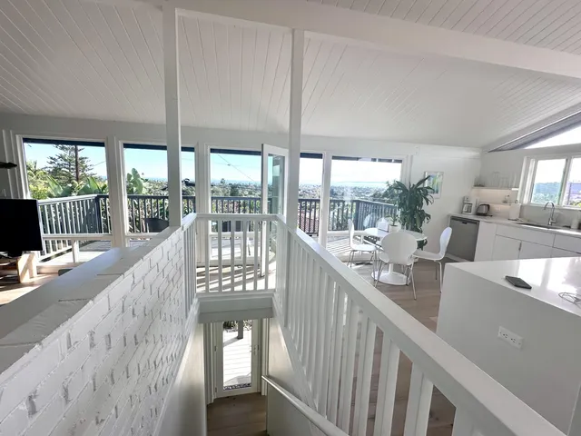 a view of living room with furniture and garden view
