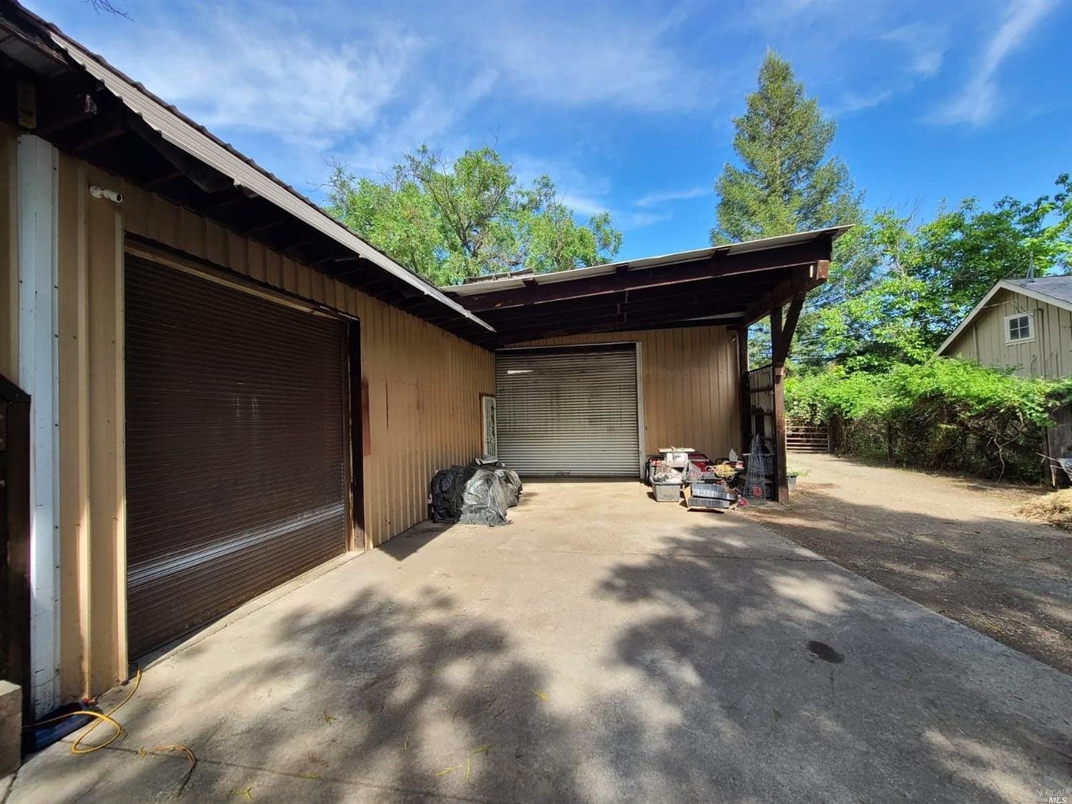 76440 Covelo Road Covelo, CA 95428 - Photo 2 of 19 a view of a wooden door and chair in the balcony