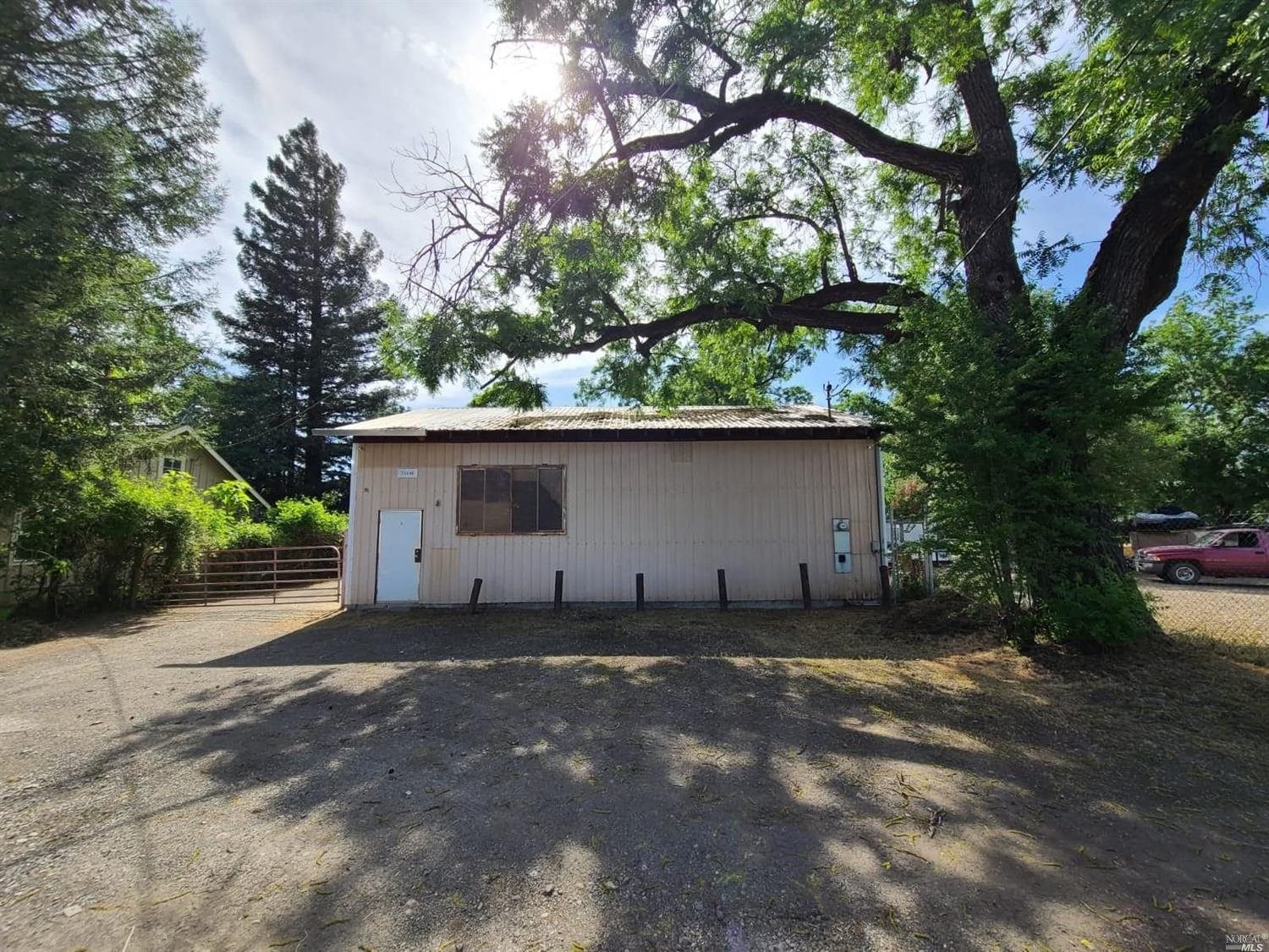 76440 Covelo Road Covelo, CA 95428 - Photo 4 of 19 a backyard of a house with lots of green space