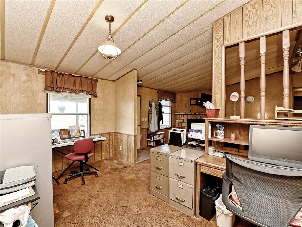148 River Road Liberty Hill, TX 78642 - Photo 13 of 22 a view of a workspace with furniture