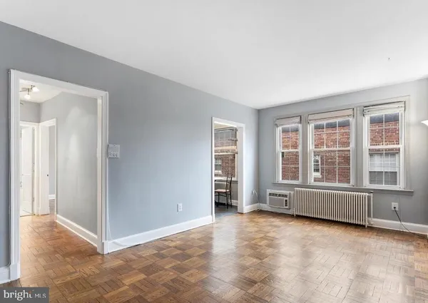 an empty room with windows