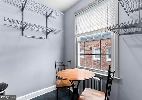a kitchen with stainless steel appliances granite countertop a stove a refrigerator and a sink with granite countertops