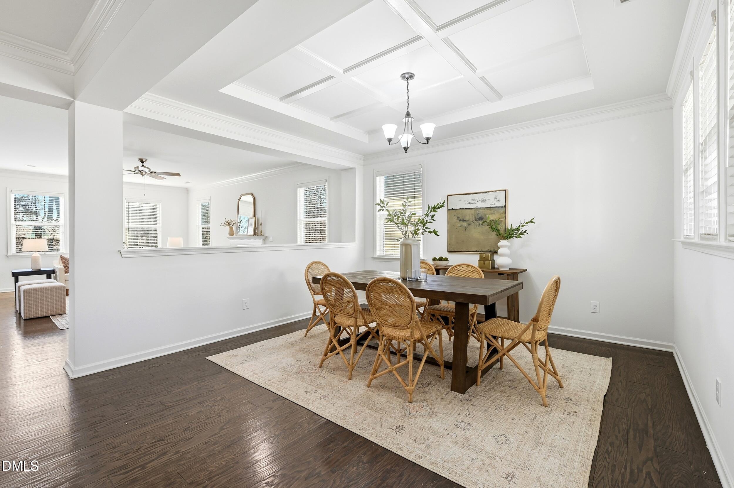 1037 Bender Ridge Drive Morrisville, NC 27560 - Photo 6 of 48 a view of a dining room with furniture window and wooden floor