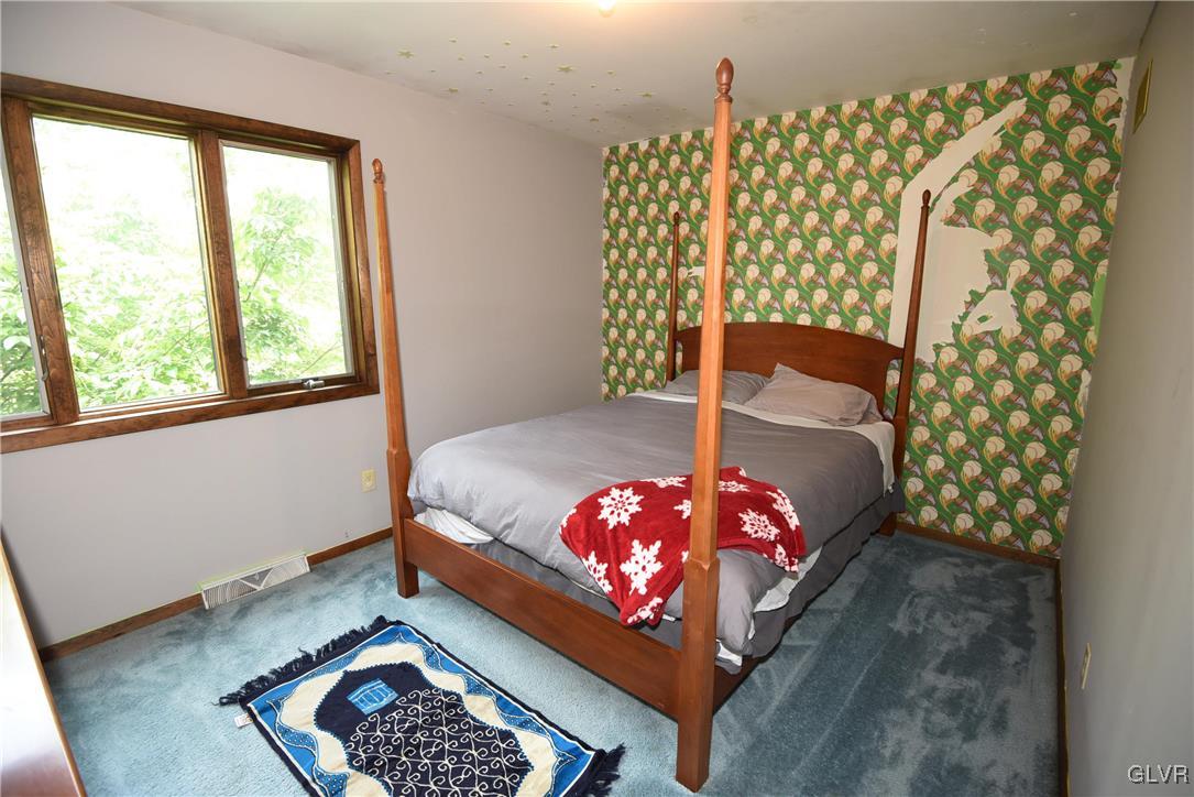 4036 Hollo Road Easton, PA 18045 - Photo 42 of 46 3rd bedroom;; wall to wall carpeting and wood trim