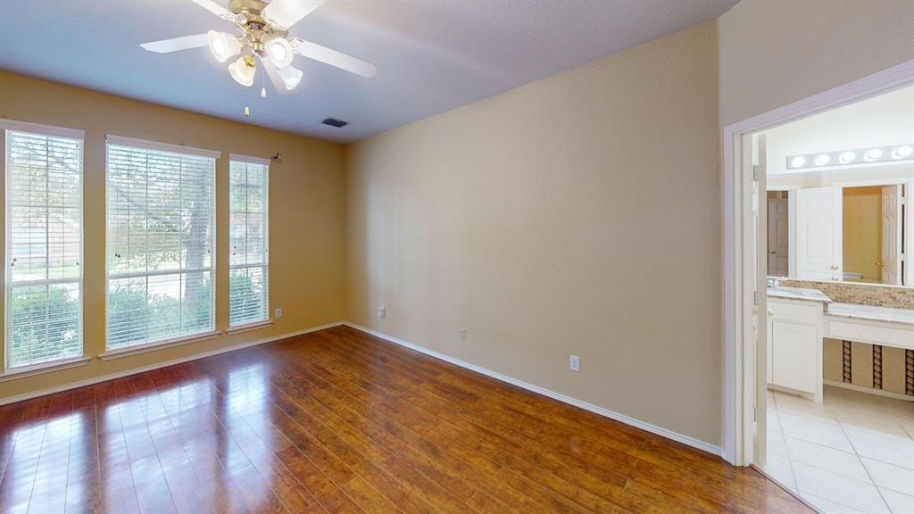 8012 Spring Peaks Drive Plano, TX 75025 - Photo 13 of 21 a view of an empty room with a window