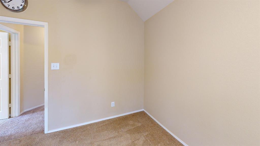 8012 Spring Peaks Drive Plano, TX 75025 - Photo 9 of 21 a view of an empty room