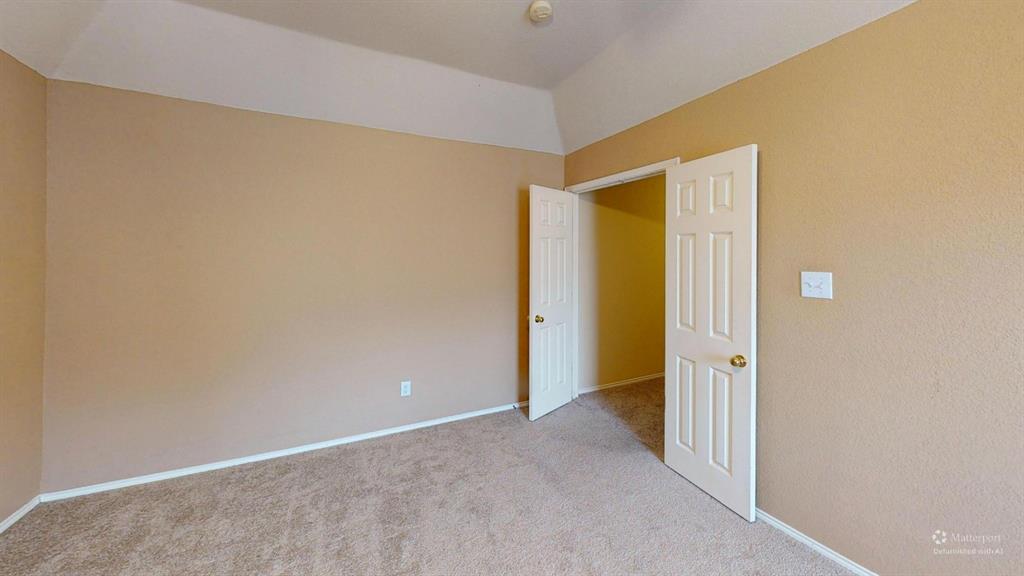8012 Spring Peaks Drive Plano, TX 75025 - Photo 10 of 21 a view of an empty room