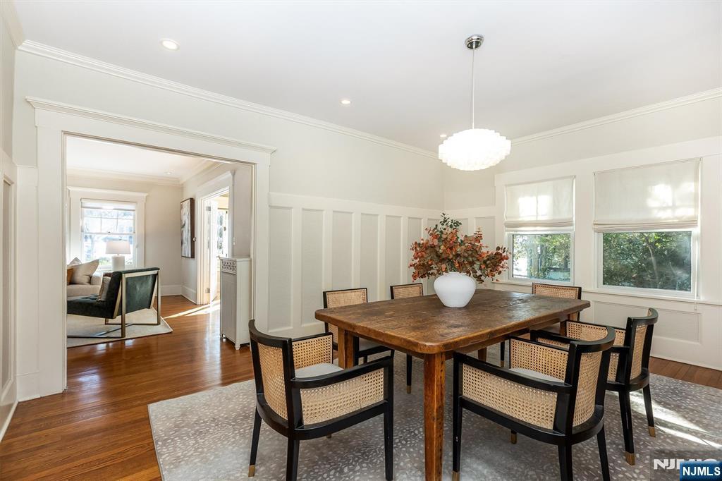 166 Montclair Avenue Montclair, NJ 07042 - Photo 12 of 38 a view of a dining room with furniture and wooden floor