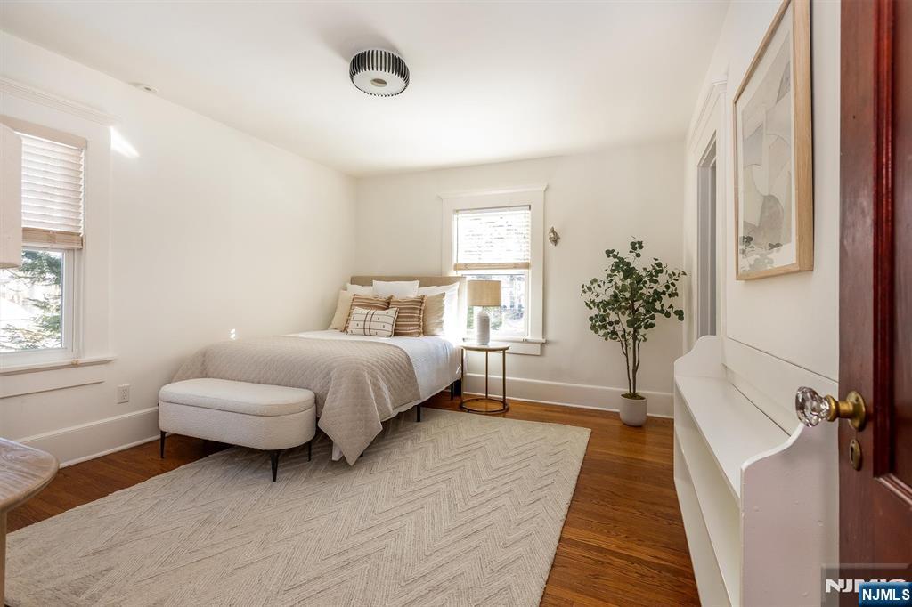 166 Montclair Avenue Montclair, NJ 07042 - Photo 25 of 38 a bedroom with a bed and a couch