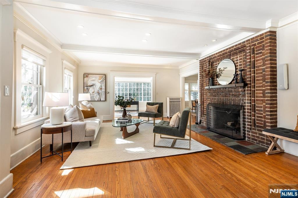 166 Montclair Avenue Montclair, NJ 07042 - Photo 4 of 38 a living room with furniture and a fireplace