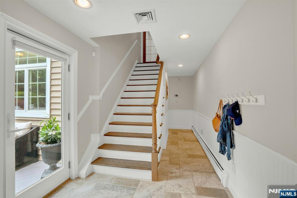 48 Hopper Farm Road Upper Saddle River, NJ 07458 - Photo 16 of 43 a view of entryway and hall with wooden floor