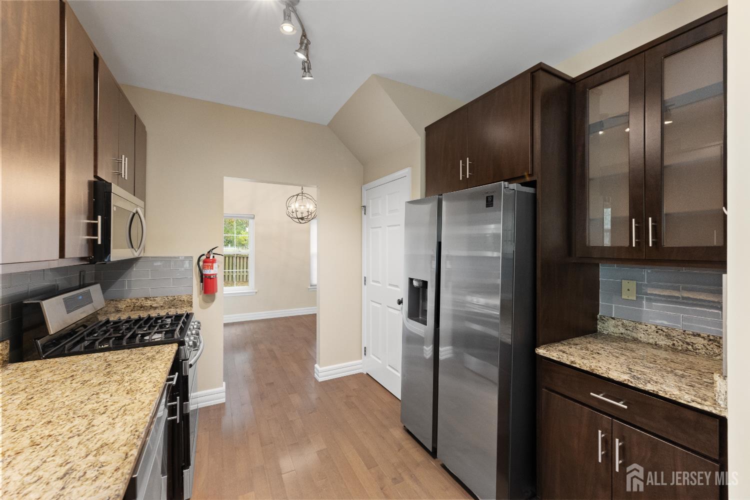 2 Rider Terrace Princeton, NJ 08540 - Photo 11 of 40 a kitchen with stainless steel appliances granite countertop a refrigerator and a stove
