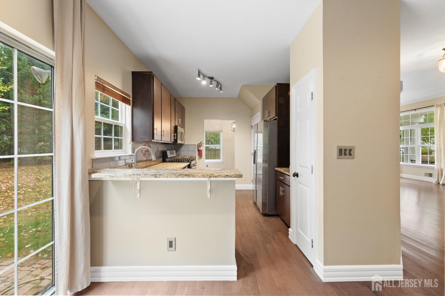 2 Rider Terrace Princeton, NJ 08540 - Photo 12 of 40 a view of kitchen with stainless steel appliances granite countertop a refrigerator and a sink