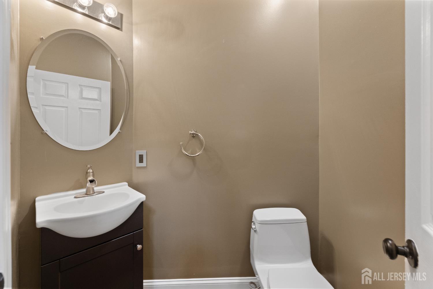 2 Rider Terrace Princeton, NJ 08540 - Photo 16 of 40 a bathroom with a toilet sink and mirror