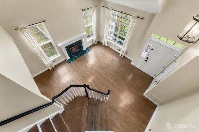 a bedroom with a bed and flat screen tv