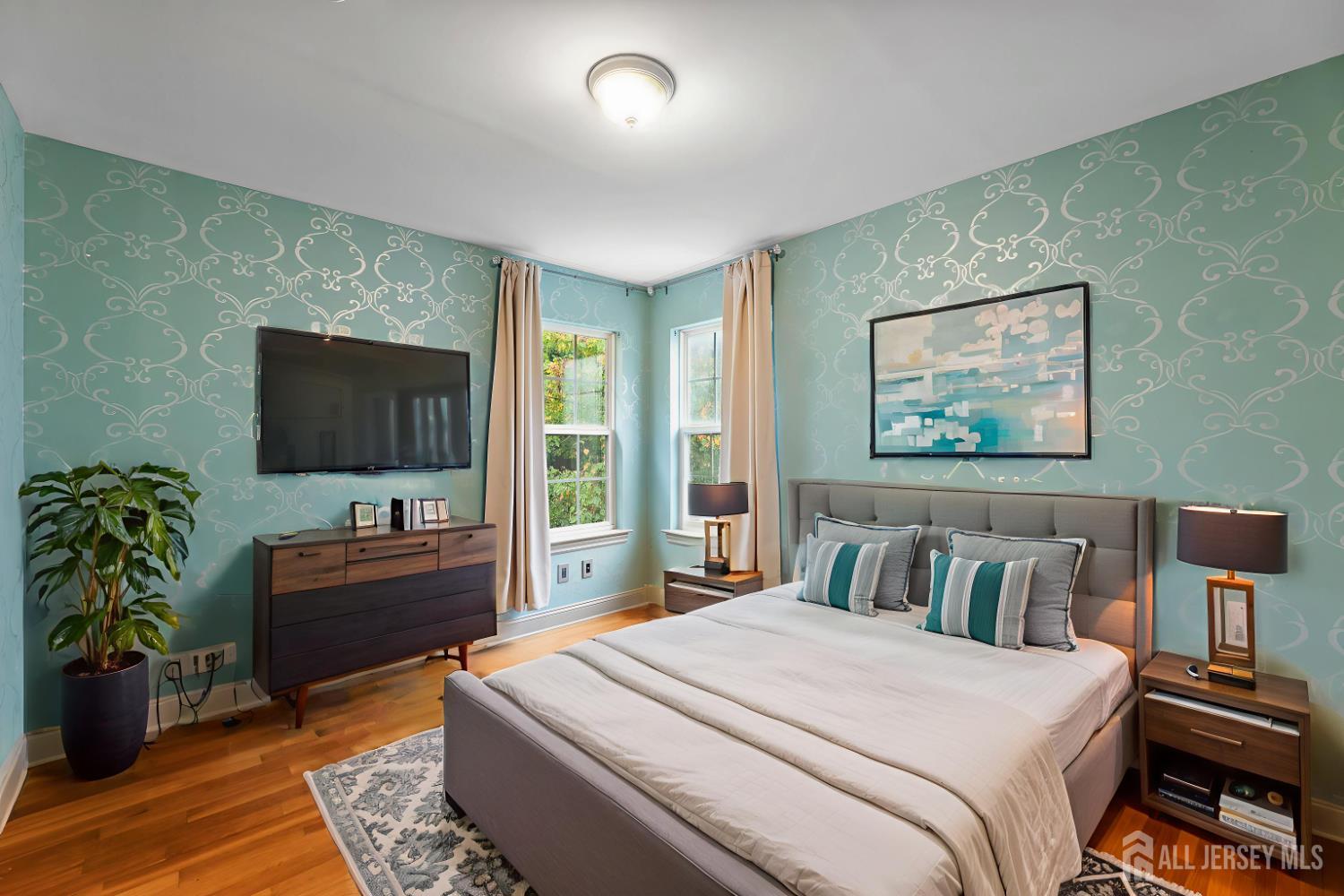 2 Rider Terrace Princeton, NJ 08540 - Photo 18 of 40 a bedroom with a bed and flat screen tv