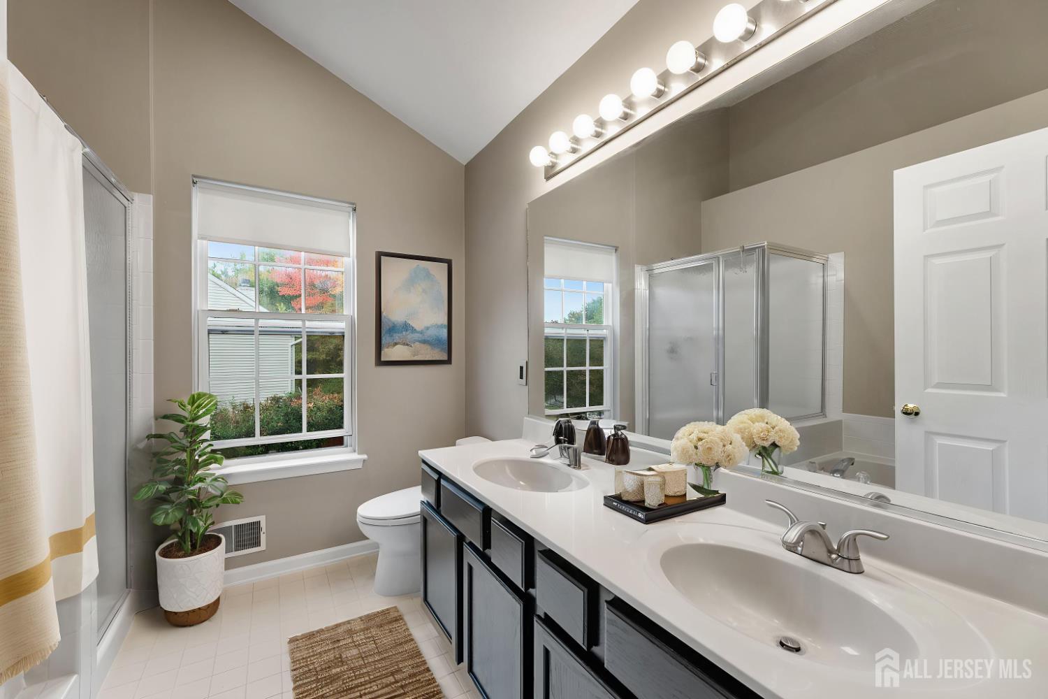 2 Rider Terrace Princeton, NJ 08540 - Photo 26 of 40 a bathroom with a sink and a mirror
