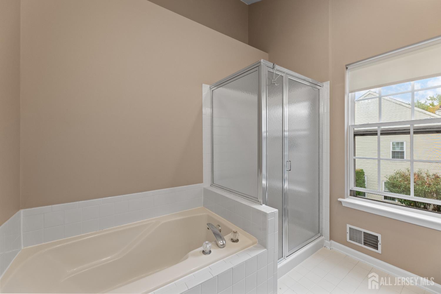 2 Rider Terrace Princeton, NJ 08540 - Photo 28 of 40 a bathroom with a bathtub and a shower