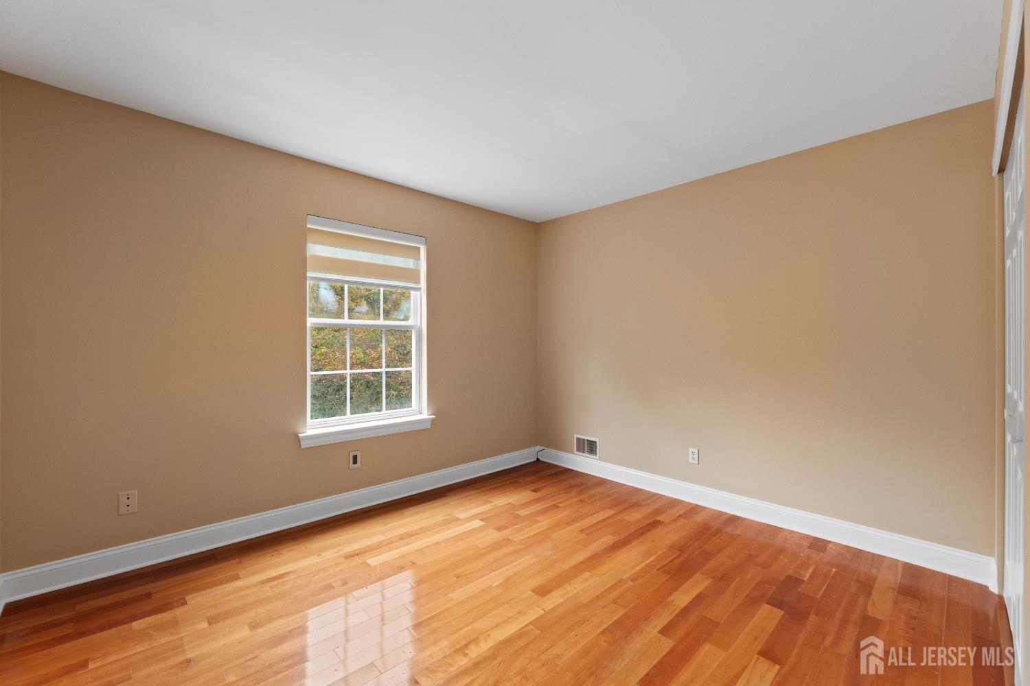 2 Rider Terrace Princeton, NJ 08540 - Photo 30 of 40 an empty room with wooden floor and windows