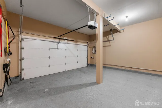 a view of a chair and table of the garden