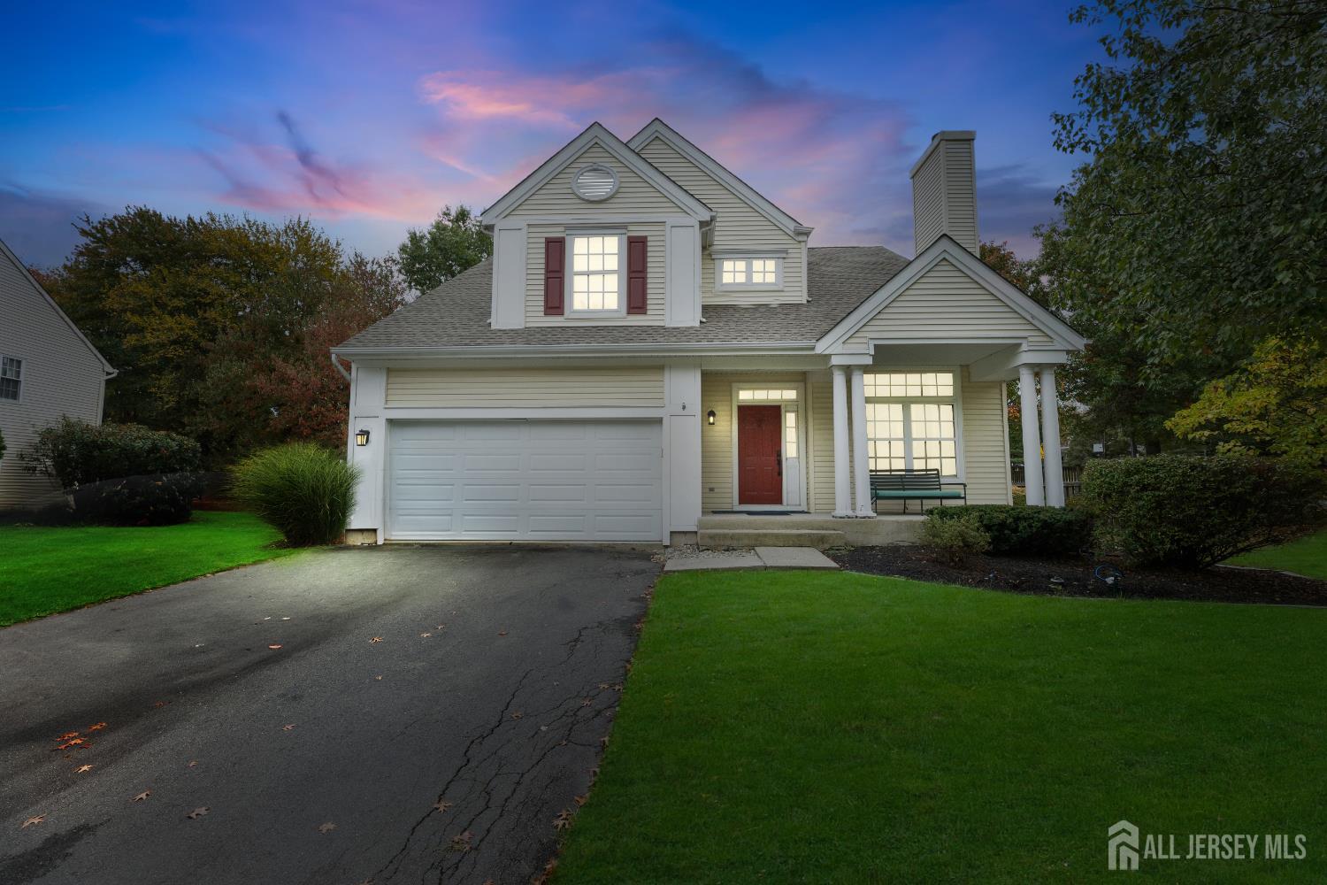 2 Rider Terrace Princeton, NJ 08540 - Photo 36 of 40 a front view of a house with a yard and garage