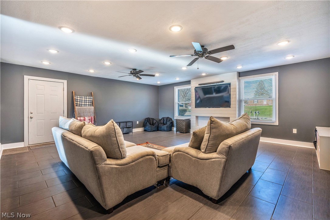 6116 Melody Road Northeast Canton, OH 44721 - Photo 4 of 33 Living room featuring recessed lighting and a ceiling fan