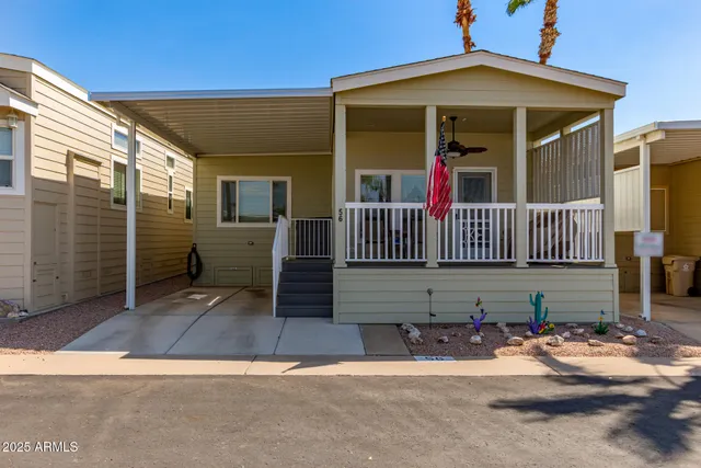 a view of house with porch