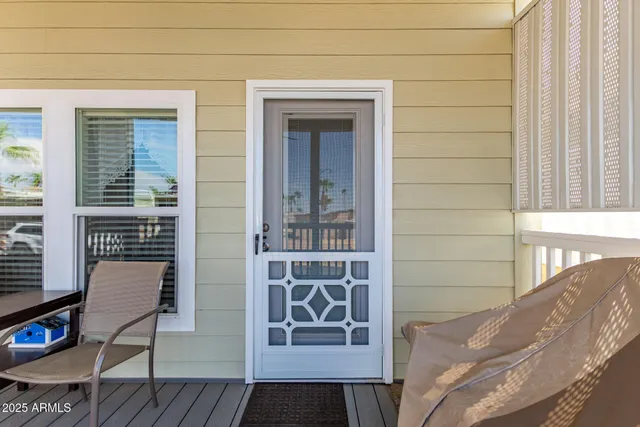 a view of front door and deck