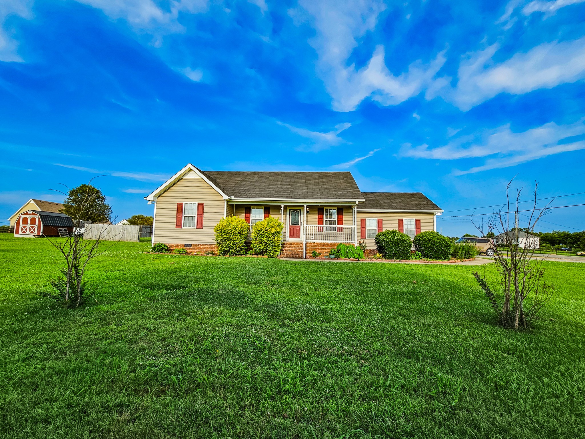 1135 County Line Road Bell Buckle, TN 37020 - Photo 2 of 16 a view of front of house with a yard