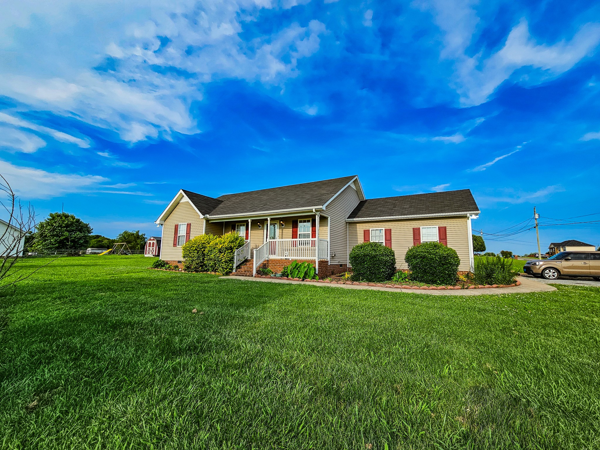 1135 County Line Road Bell Buckle, TN 37020 - Photo 3 of 16 a view of a house with a big yard