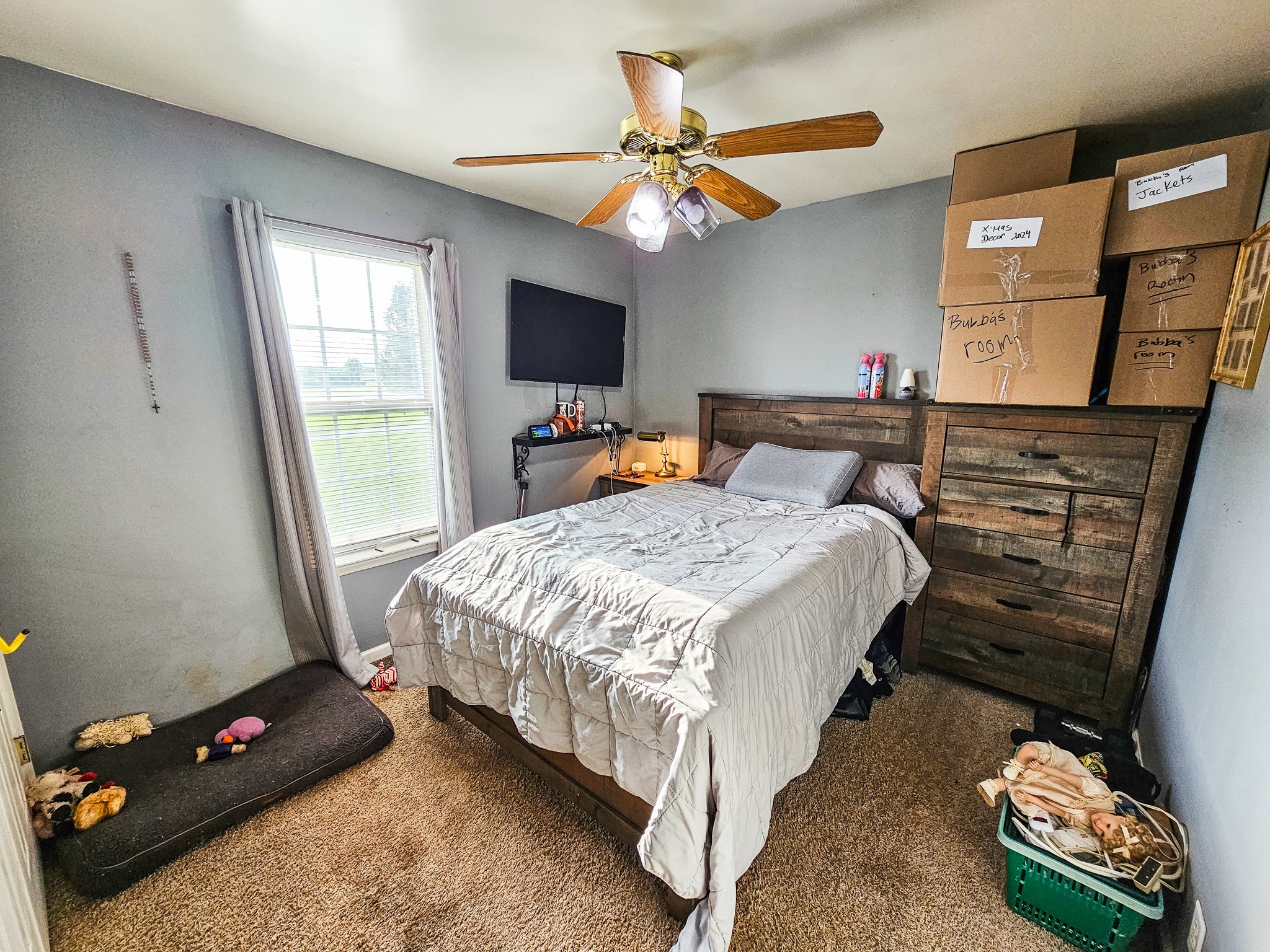 1135 County Line Road Bell Buckle, TN 37020 - Photo 9 of 16 a bedroom with a bed and a tv
