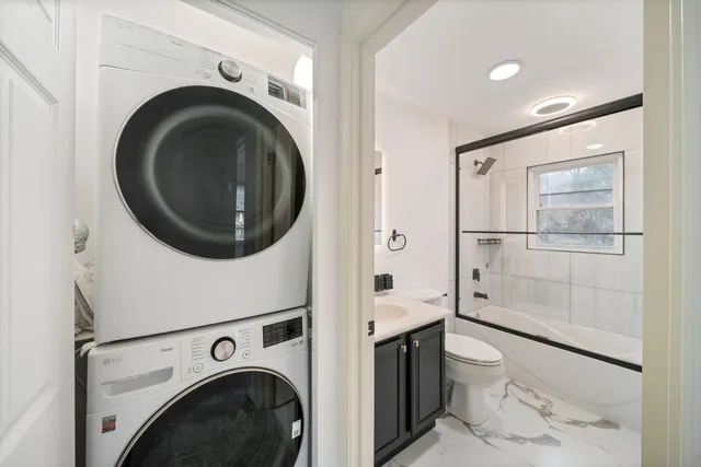 a bathroom with a toilet and a sink