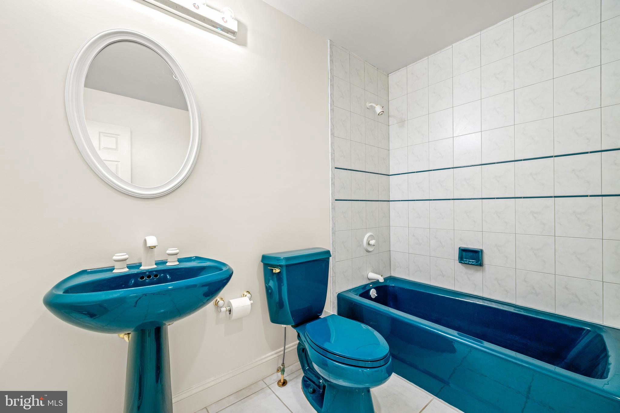 13019 Jerome Jay Drive Cockeysville, MD 21030 - Photo 49 of 61 a bathroom with a sink and a mirror