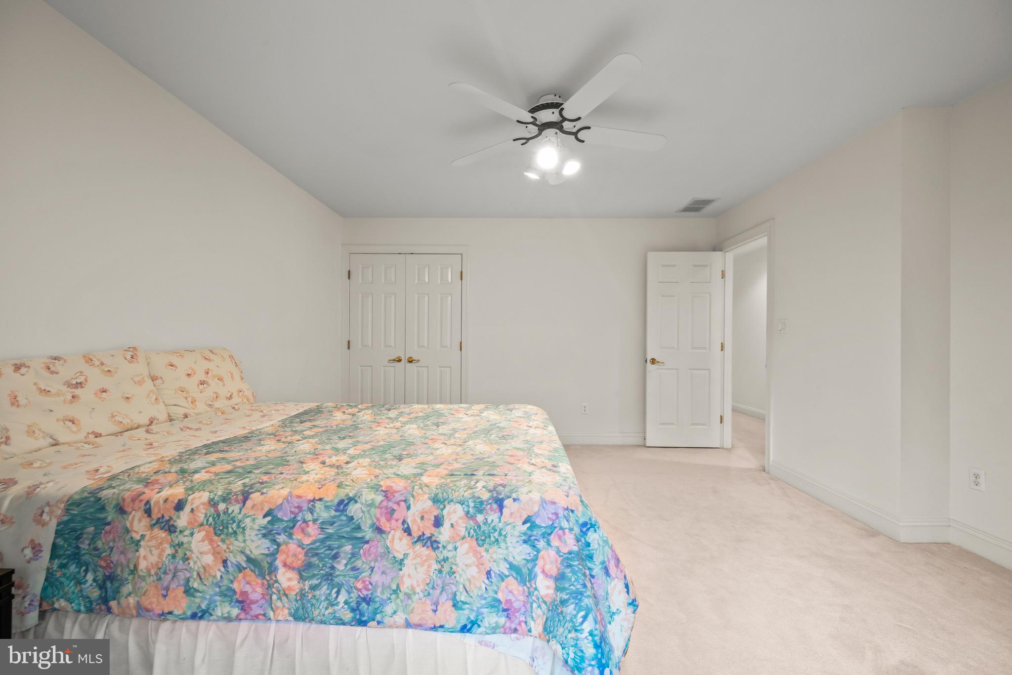 13019 Jerome Jay Drive Cockeysville, MD 21030 - Photo 53 of 61 a bedroom with a bed and lamp