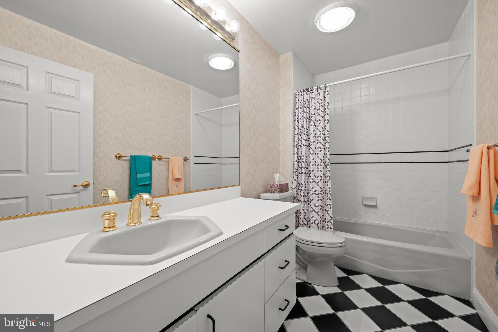 13019 Jerome Jay Drive Cockeysville, MD 21030 - Photo 59 of 61 a bathroom with a sink toilet and shower