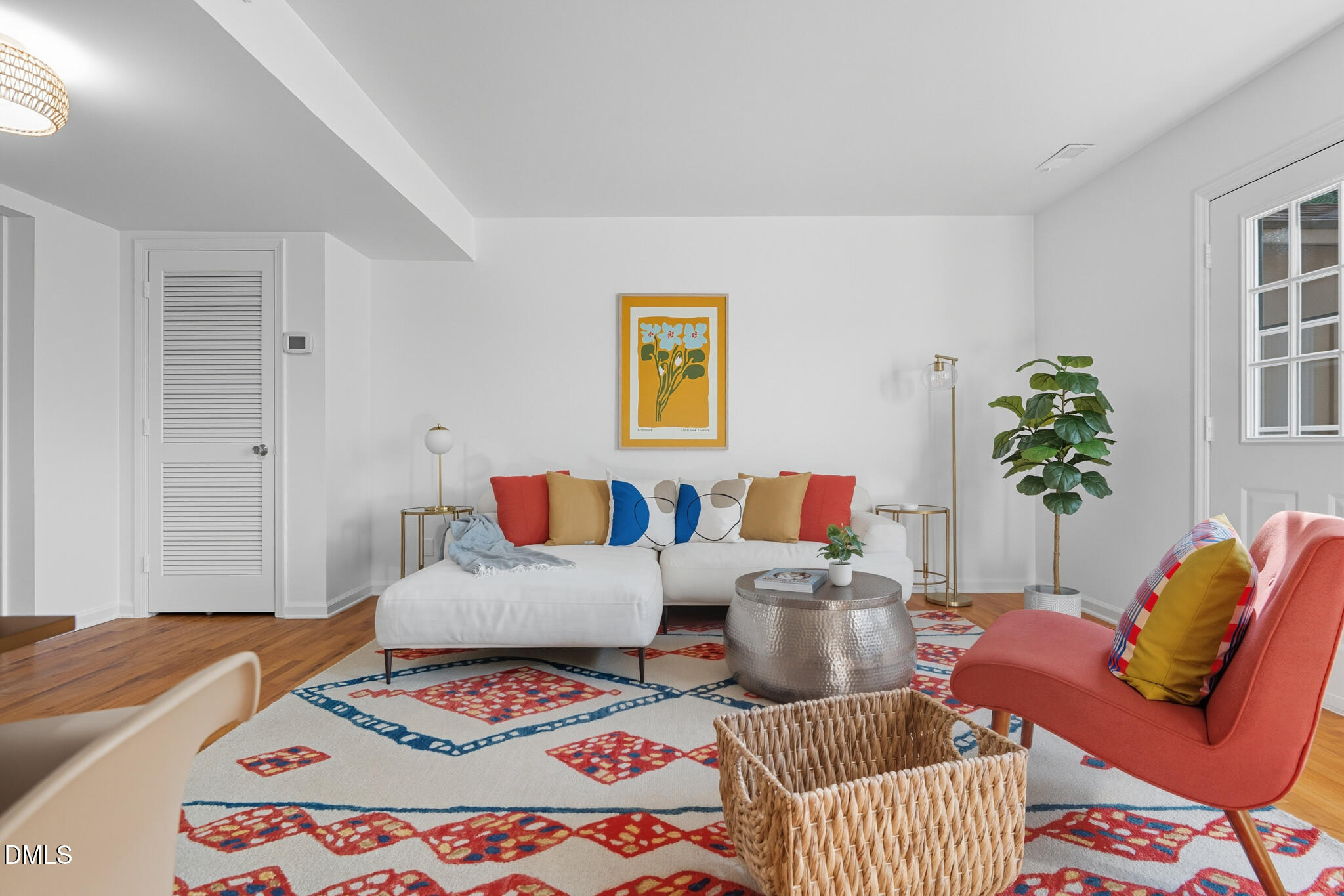 105 Fidelity Street, Unit B9 Carrboro, NC 27510 - Photo 11 of 50 a living room with furniture and a potted plant