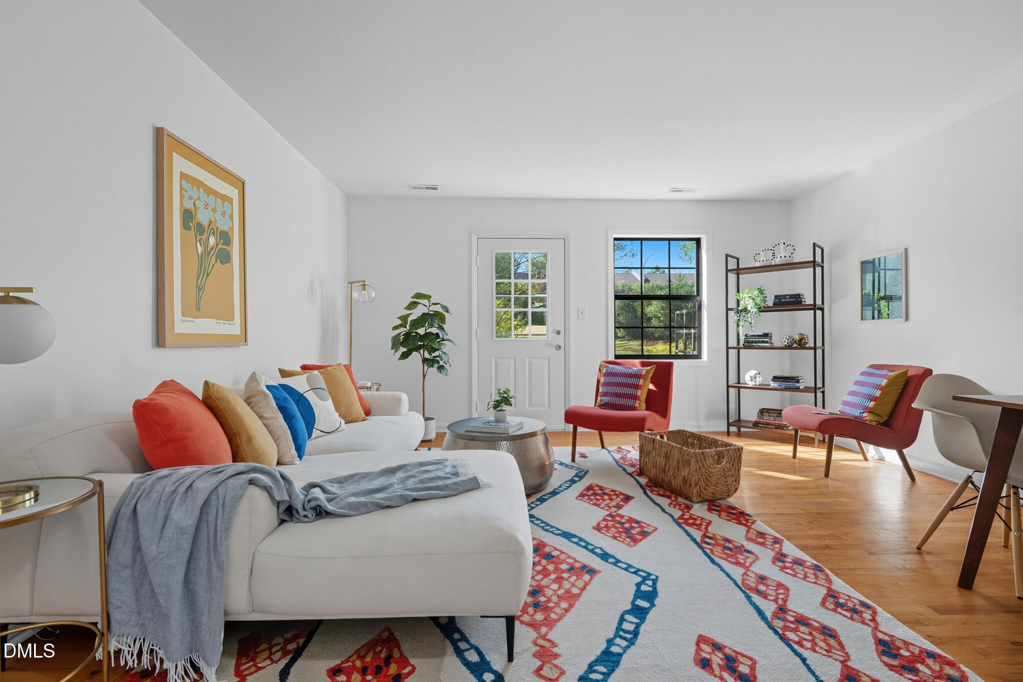 105 Fidelity Street, Unit B9 Carrboro, NC 27510 - Photo 12 of 50 a living room with furniture and a wooden floor