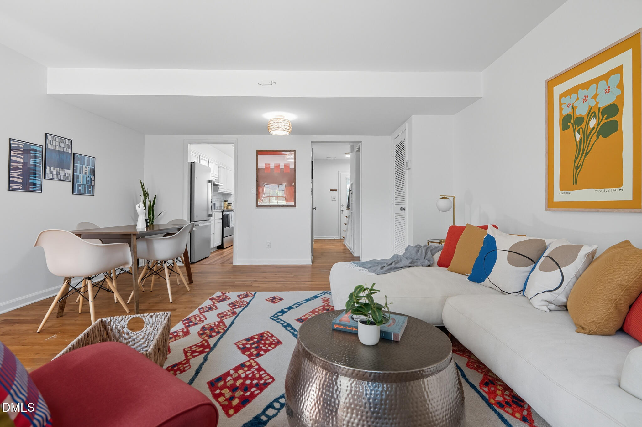 105 Fidelity Street, Unit B9 Carrboro, NC 27510 - Photo 13 of 50 a living room with furniture and wooden floor