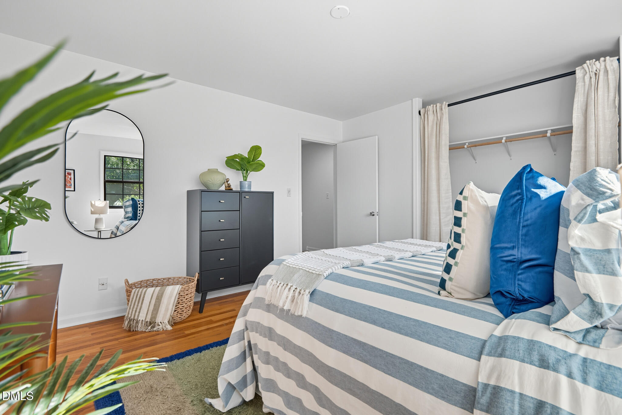 105 Fidelity Street, Unit B9 Carrboro, NC 27510 - Photo 27 of 50 a bedroom with a bed and a dresser