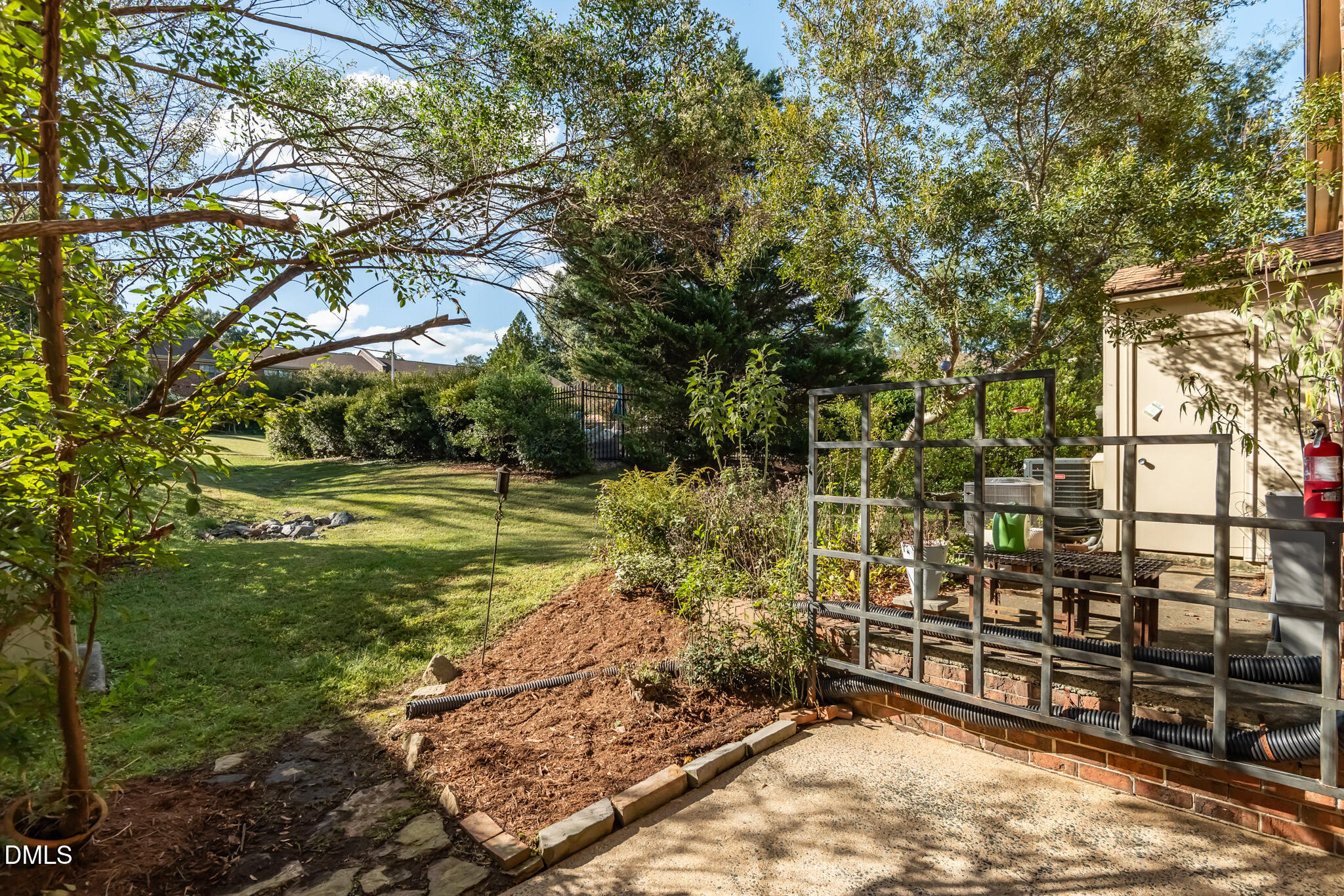 105 Fidelity Street, Unit B9 Carrboro, NC 27510 - Photo 36 of 50 a view of a yard with wooden fence