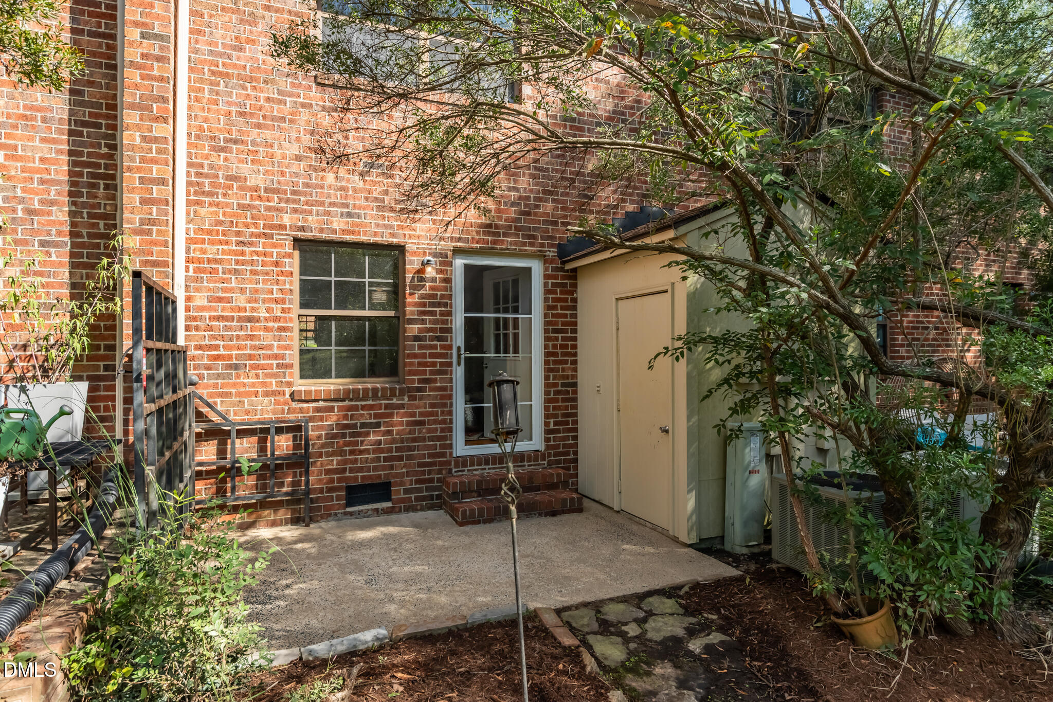 105 Fidelity Street, Unit B9 Carrboro, NC 27510 - Photo 37 of 50 a backyard of a house with seating space