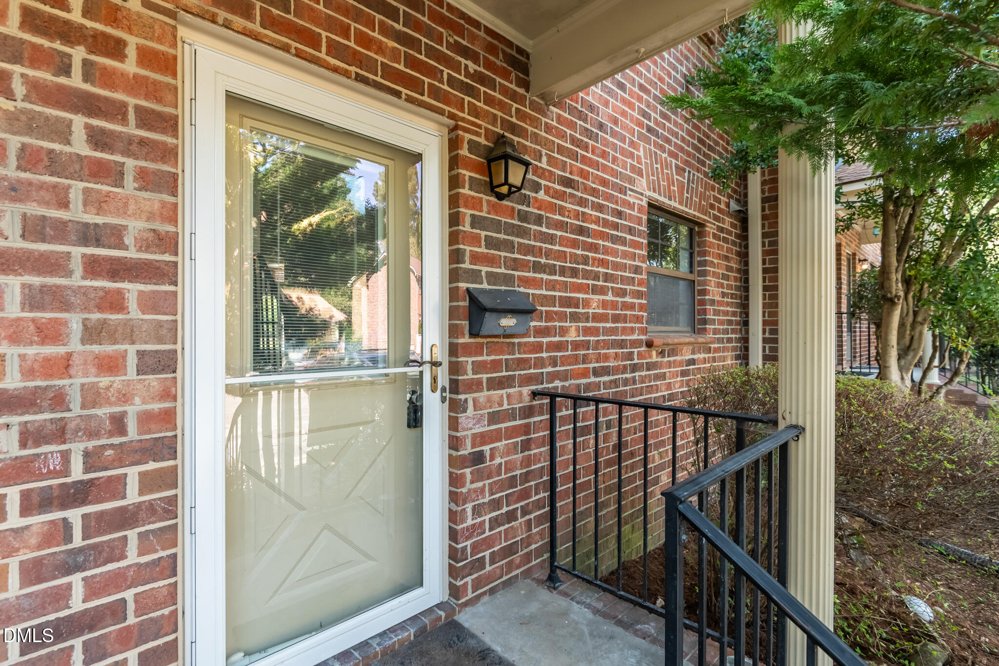 105 Fidelity Street, Unit B9 Carrboro, NC 27510 - Photo 3 of 50 a view of a brick house with a large window