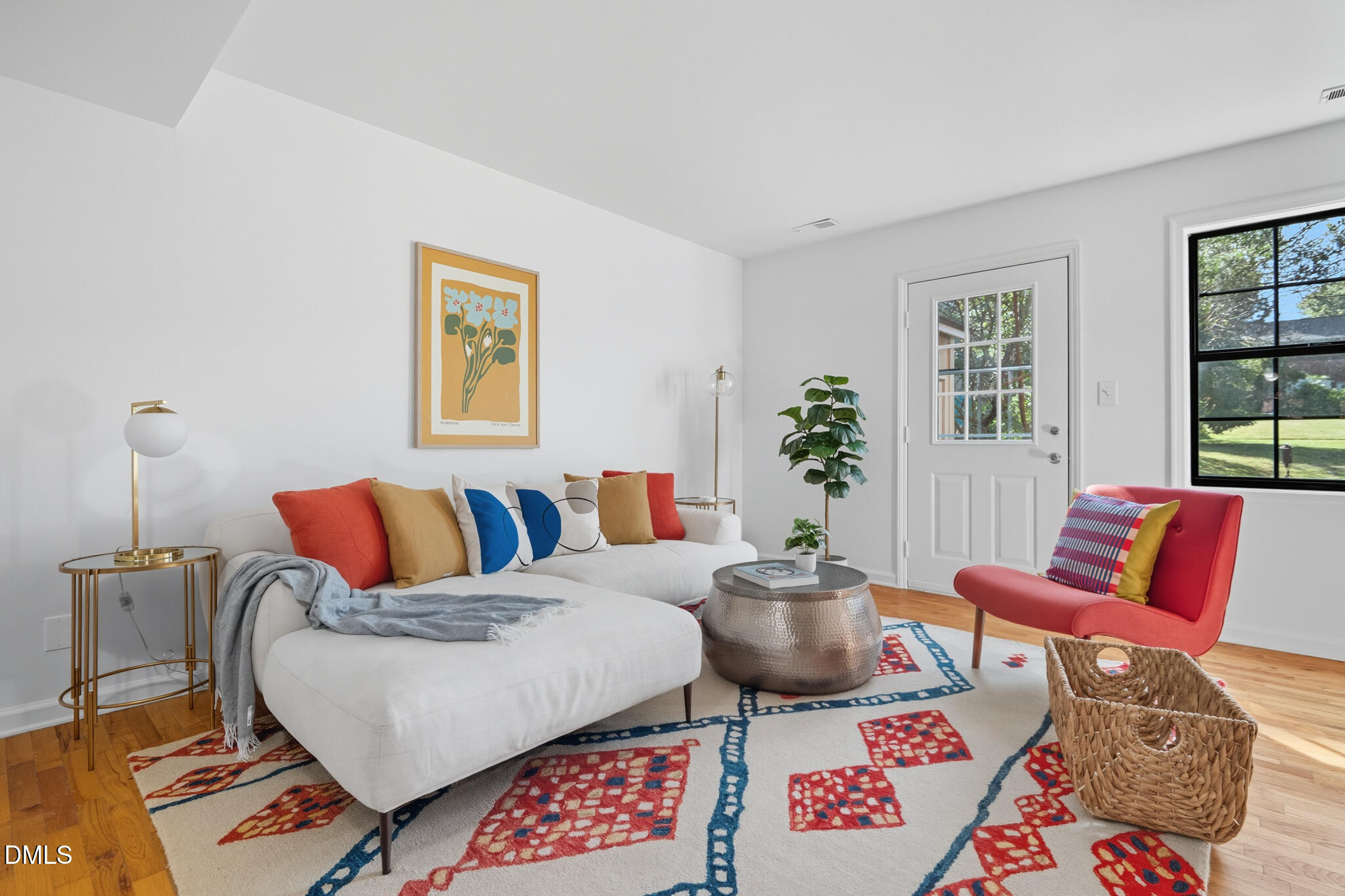 105 Fidelity Street, Unit B9 Carrboro, NC 27510 - Photo 5 of 50 a living room with furniture a rug and a window
