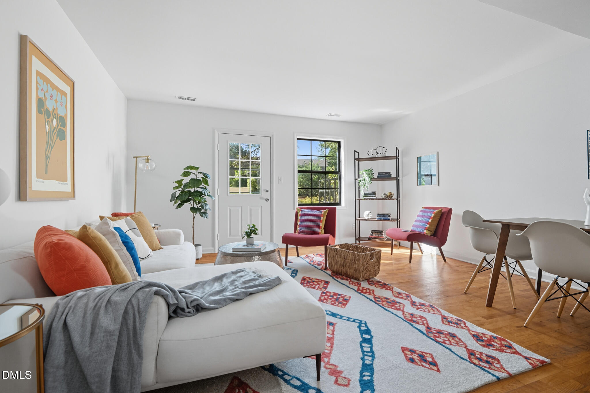 105 Fidelity Street, Unit B9 Carrboro, NC 27510 - Photo 6 of 50 a living room with furniture a rug and a large window