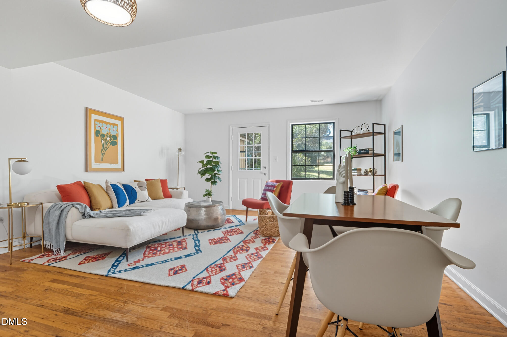 105 Fidelity Street, Unit B9 Carrboro, NC 27510 - Photo 7 of 50 a living room with furniture window and wooden floor