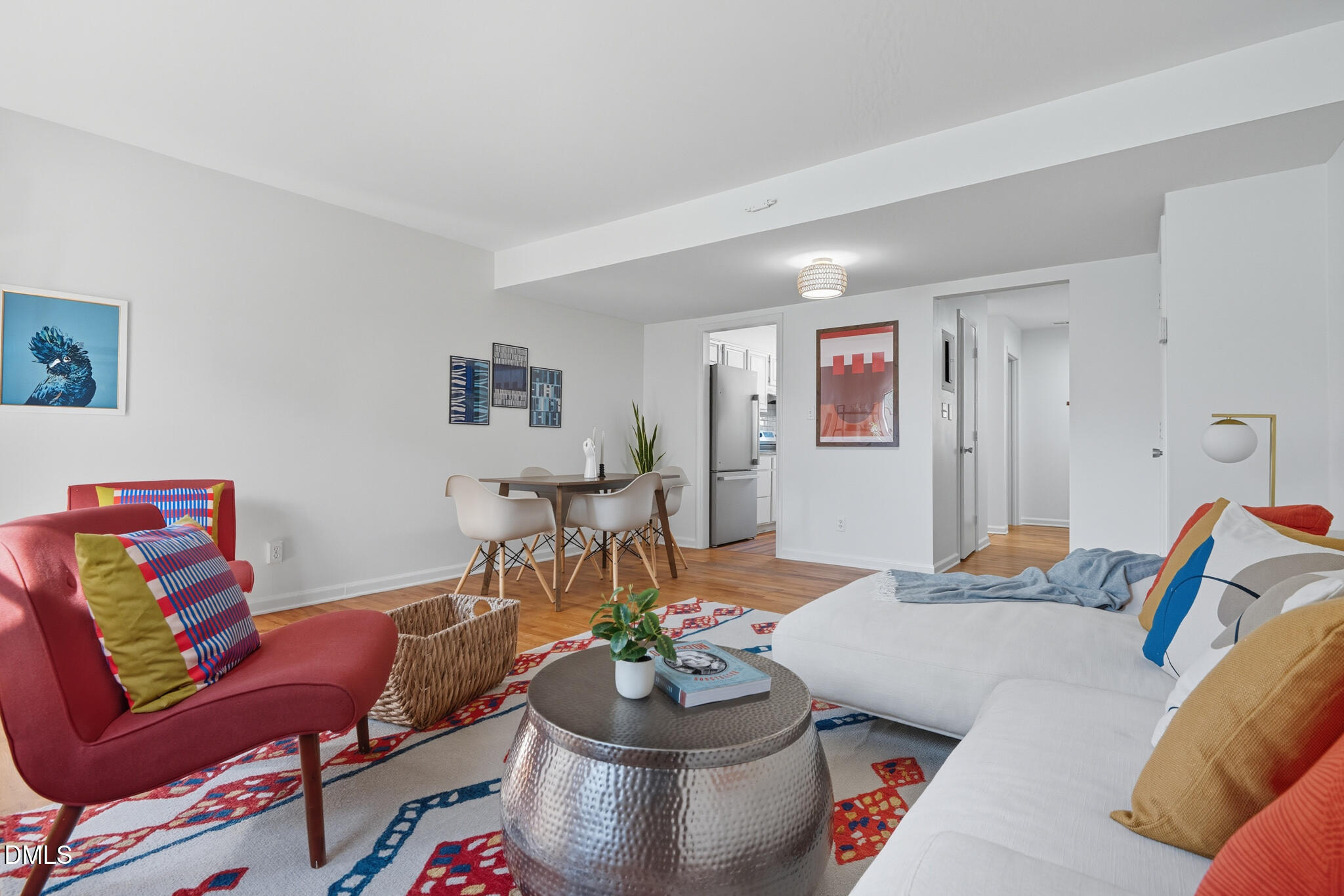 105 Fidelity Street, Unit B9 Carrboro, NC 27510 - Photo 8 of 50 a living room with furniture and a wooden floor